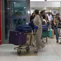 Passengers arriving from Dubai at IGI Airport describe contrasting situations