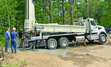 The Geoprobe DM650 air rotary drill rig provides time-saving features like backloading carousel and top head side shift