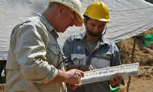 Geopacific Resources MD Ron Heeks (left) examining Woodlark samples