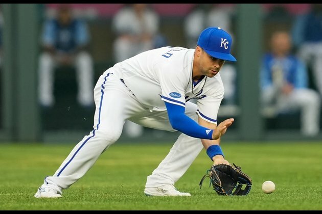 Whit Merrifield says he's vaccinated, can play games in Toronto