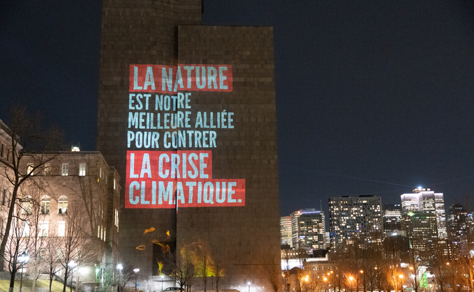 A light display projected on Montreal's Palais de Justice | Credit: Holly Chapman, WWF