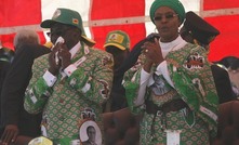  In December, reports surfaced that Robert Mugabe (left) was supplanted by his wife Grace (right) in a palace coup