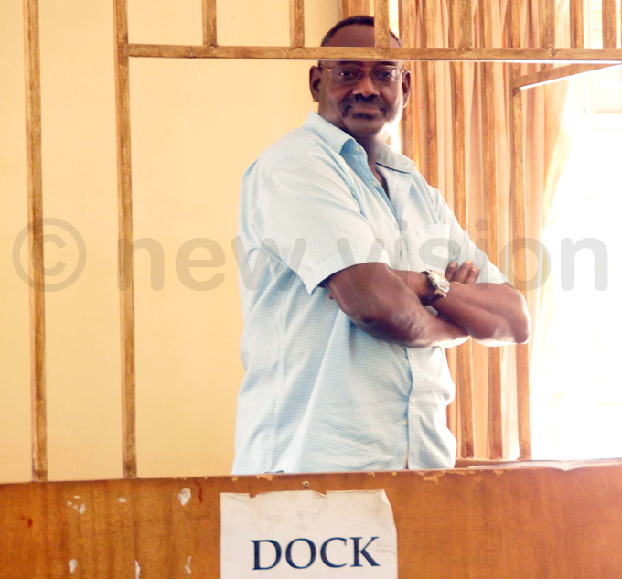 en ejusa looks on from the dock during court proceedings hoto by ennis ibele