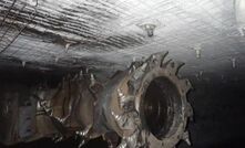 The cutter head of a continuous miner hit a mega bolt tail. 