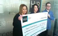 Hib presents cheques to chosen charities