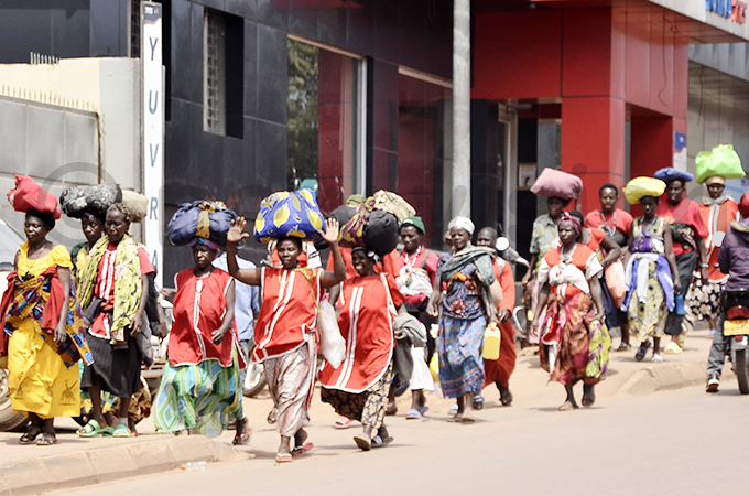 ilgrims from yamuhanga arish in barara rchdiocese on inja oad as they head to amugongo hoto by onnie ijjambu