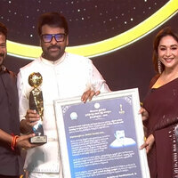 Madhuri Dixit presents NTR National Award to Chiranjeevi at Gaddar Awards