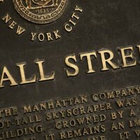 Wall Street settles down after tariffs-induced volatility