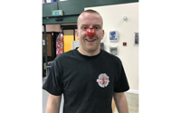 Covers raises £564 in a 'close shave' for charity
