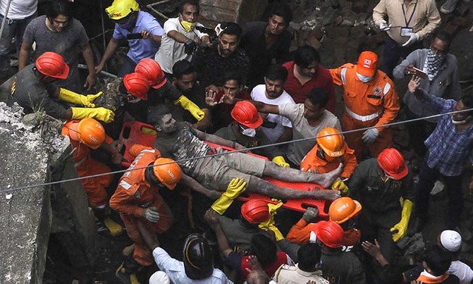 Rescuers call off search for victims in India building collapse Rescuers call off search for victims in India building collapse
