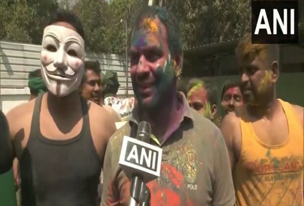 RJD's Tej Pratap Yadav celebrates Holi with party workers at his residence in Patna