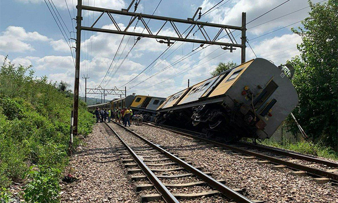 South African train collision kills three, injures 600 South African train collision kills three, injures 600