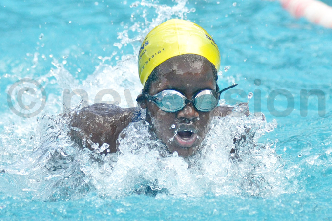  olphins wim lubs annat akimuli in action in the 50m butterfly hoto by ichael subuga
