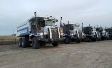 Trucks fitted with autonomous technology at the Zhundong open pit coal mine.