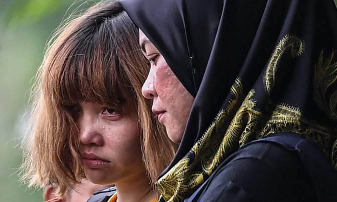 Malaysian court charges two women with Kim murder Malaysian court charges two women with Kim murder