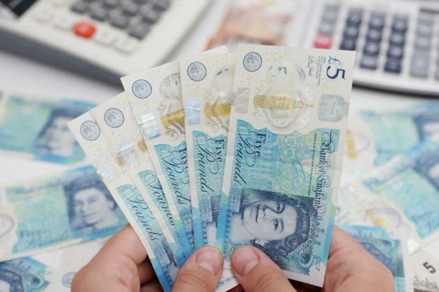 Tax Cut Plans Pull British Pound to 4 Decade Lows