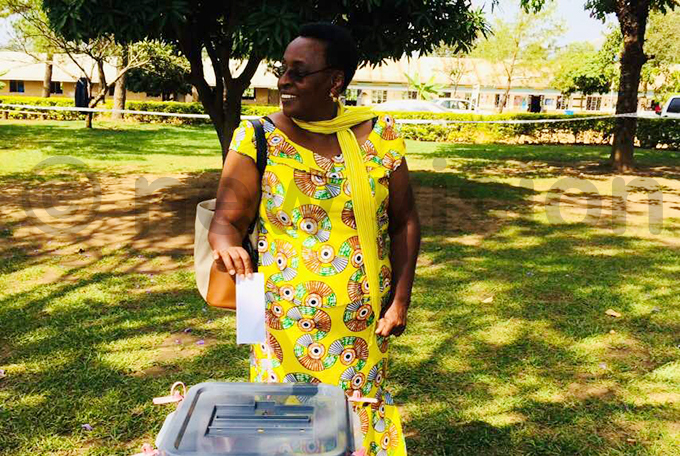 s aome ibaaju casts her vote at asheruka odern polling station hoto by bdulkarim sengendo