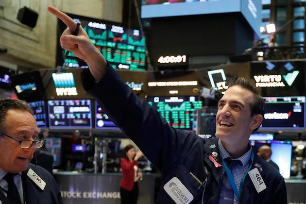 Wall Street closes out week with heady gains