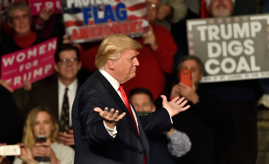 Coal has long been on the agenda for President Trump (pictured at a rally in 2016)