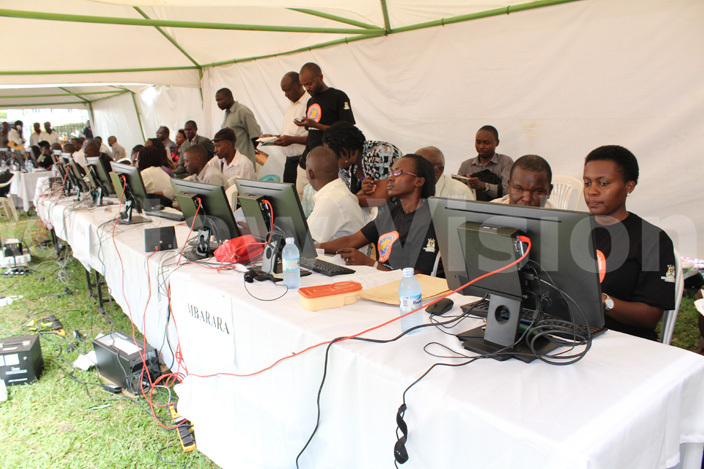 inistry of lands staff handle clients complaints at the help desk during the pen ay