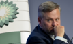 BP CEO Murray Auchincloss faces a pay cut as the energy giant navigates falling profits, operational hurdles, and a strategic shift back to oil and gas.