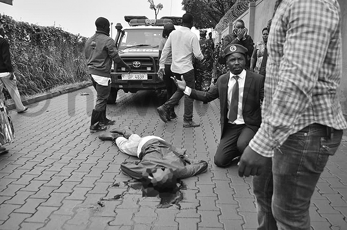 ne of the protestors next to the lifeless body of avid ibuuka hoto by onsiano simbi