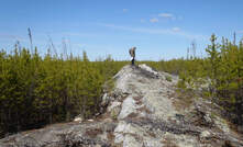 Investors like lithium, found at this large outcropping pegmatite dyke, Canada