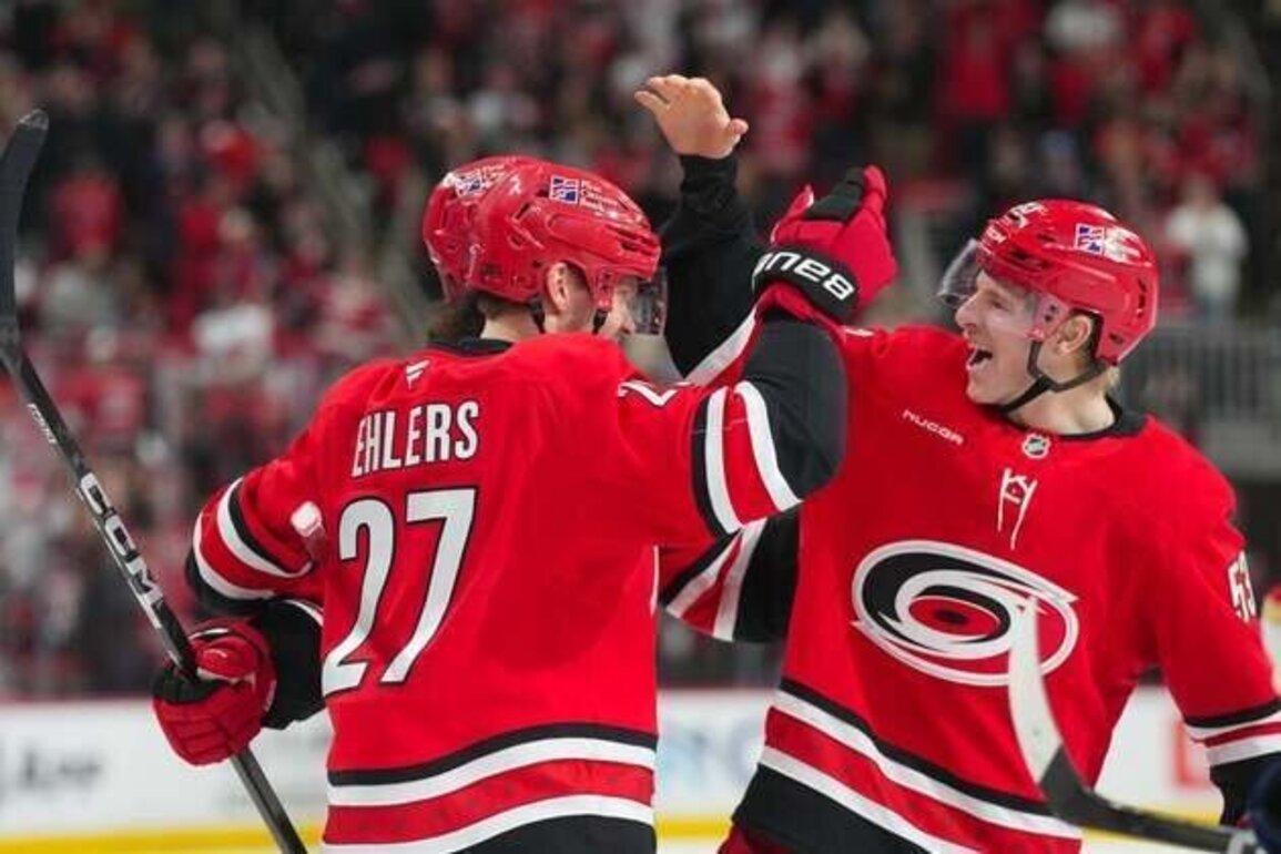Hurricanes, after 9-goal explosion, take aim at Devils