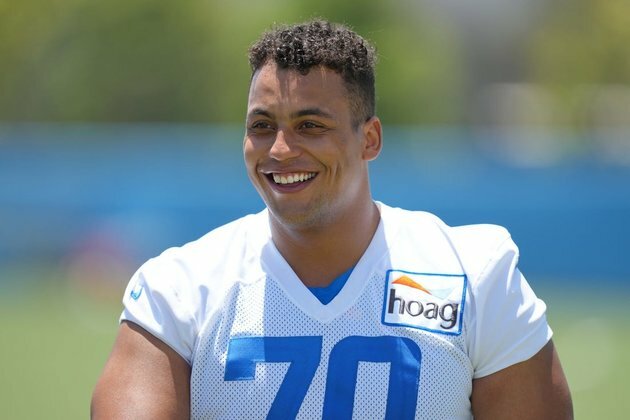 Chargers OL Rashawn Slater (biceps) done for season