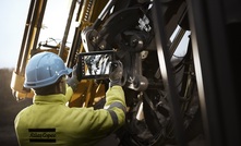 An Atlas Copco technician performing a RigScan audit before rebuild