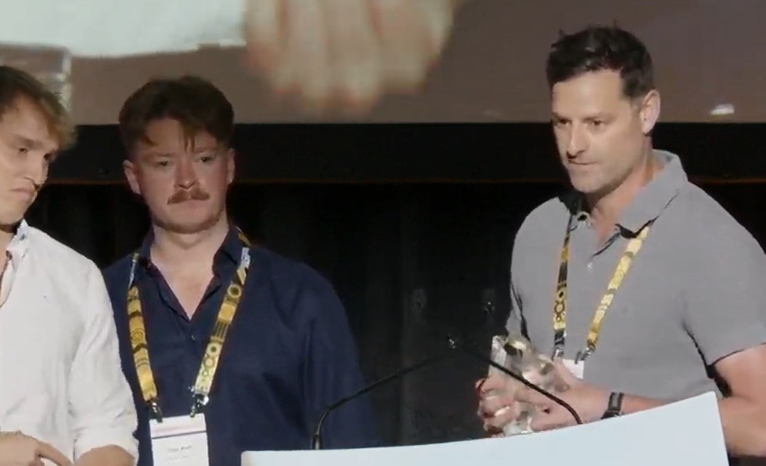 The Capricorn team accepts the 2026 Craig Oliver Award