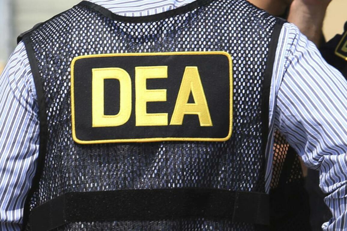 Ex-DEA agent charged with pointing gun at co-worker, motorist