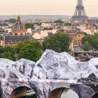 Giant inflatable cave created by artist covers Paris’ oldest bridge