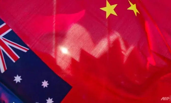 Aussie lawmaker targeted in China spy raid insists innocence Aussie lawmaker targeted in China spy raid insists innocence