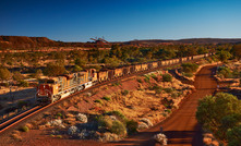 A BHP iron ore train near Newman in Western Australia