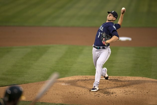 A's travel to Seattle with AL wild-card spot still in play