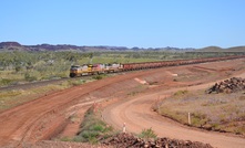 Iron ore being transported by rail in the Pilbara