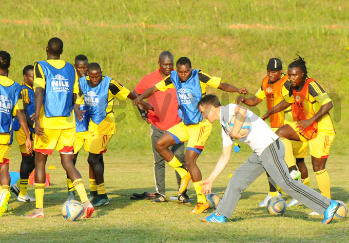 ranes players are put through their paces by coach icho redojevic during training on onday hotos by palanyi sentongo