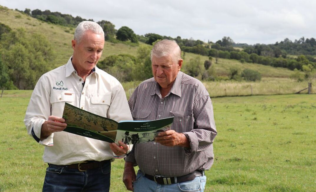 Rural Aid's John Warlters and Queensland beef farmer Ron Gehrke discussing the Pulse of the Paddock survey results.