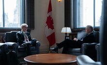 Canada's minister of natural resources, Tim Hodgson, and prime minister Mark Carney.