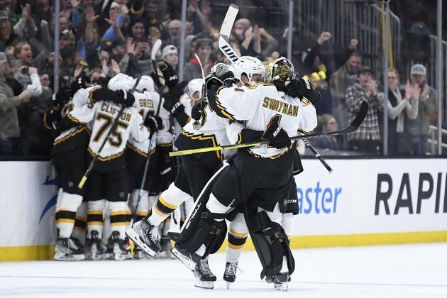 NHL roundup: Bruins make history with OT win