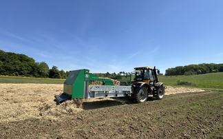 Can potatoes go no-till? Spread-a-Bale machine supports straw-based solution