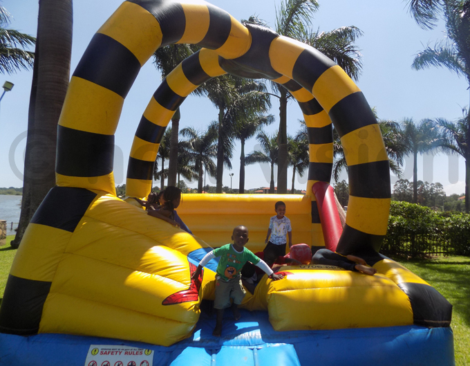 hildren playing on a bouncing castle hoto by acquiline akandi