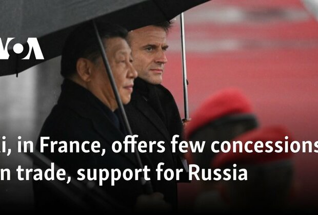 Xi, in France, offers few concessions on trade, support for Russia