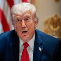 President Trump wears Jordan Stolz's Olympic gold medal
