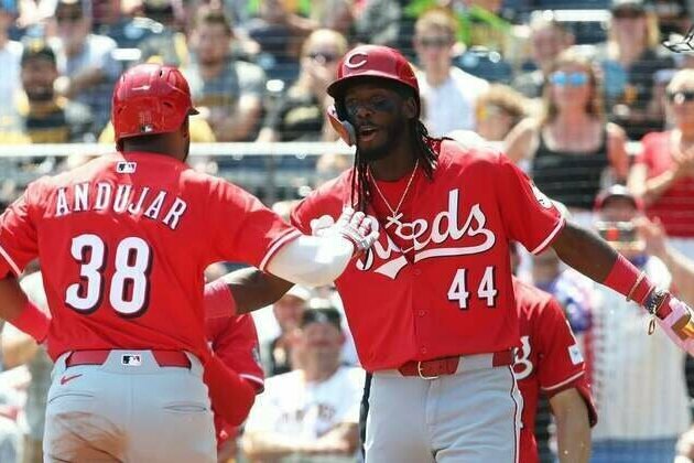 Reds pull away from Pirates in slugfest