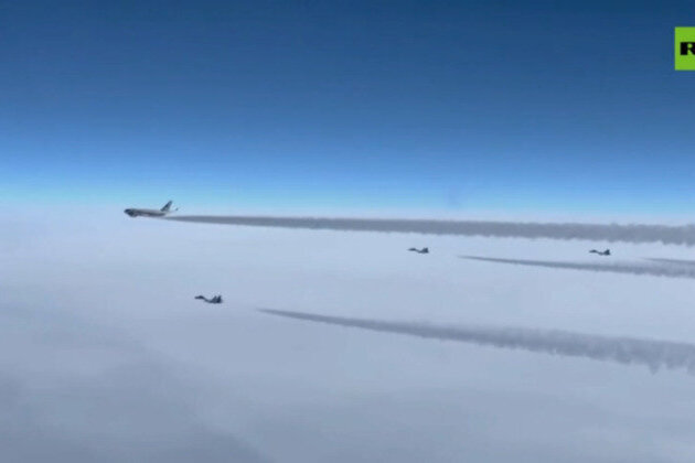 fighter jets escort Putins plane into Kazakhstan