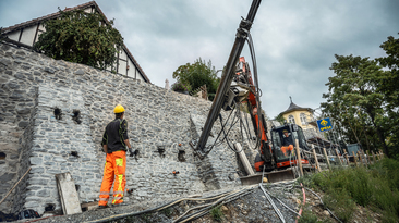 Injection boreholes and masonry nails were installed along with structural reinforcement using self-drilling anchors