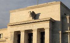Fed expects to raise rates three times next year