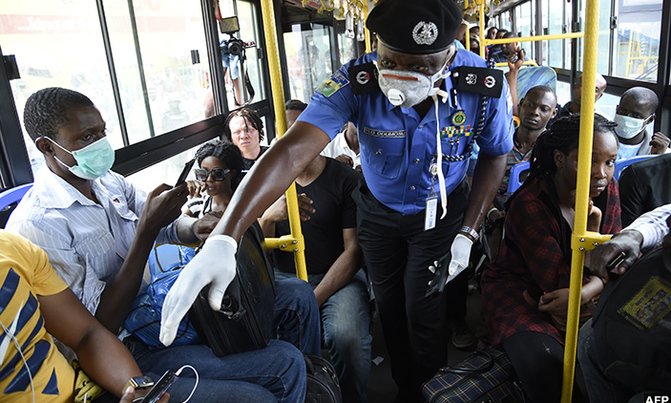 Nigeria orders lockdown in Lagos, Abuja over virus Nigeria orders lockdown in Lagos, Abuja over virus